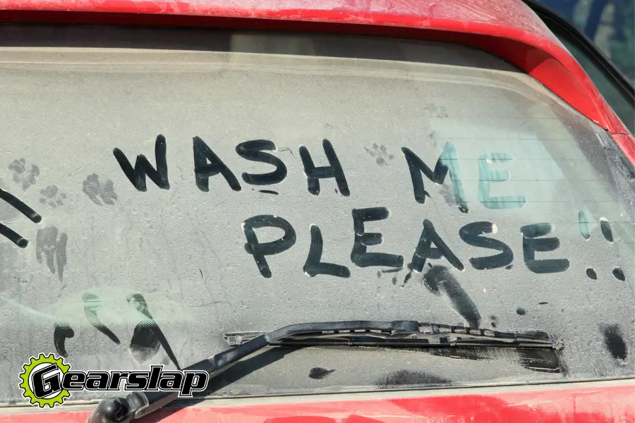 Car windshield wash me writing clean windows