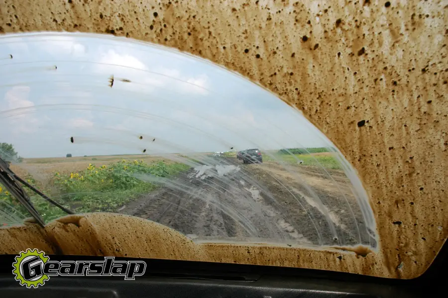 Dirty windshield wipers muddy expired washer fluid