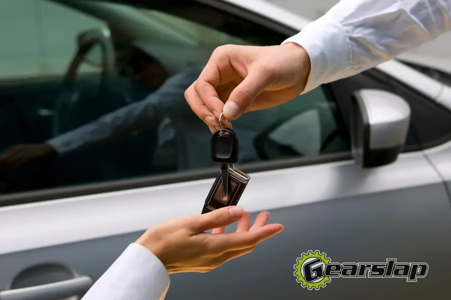 Girl test driving car from dealership