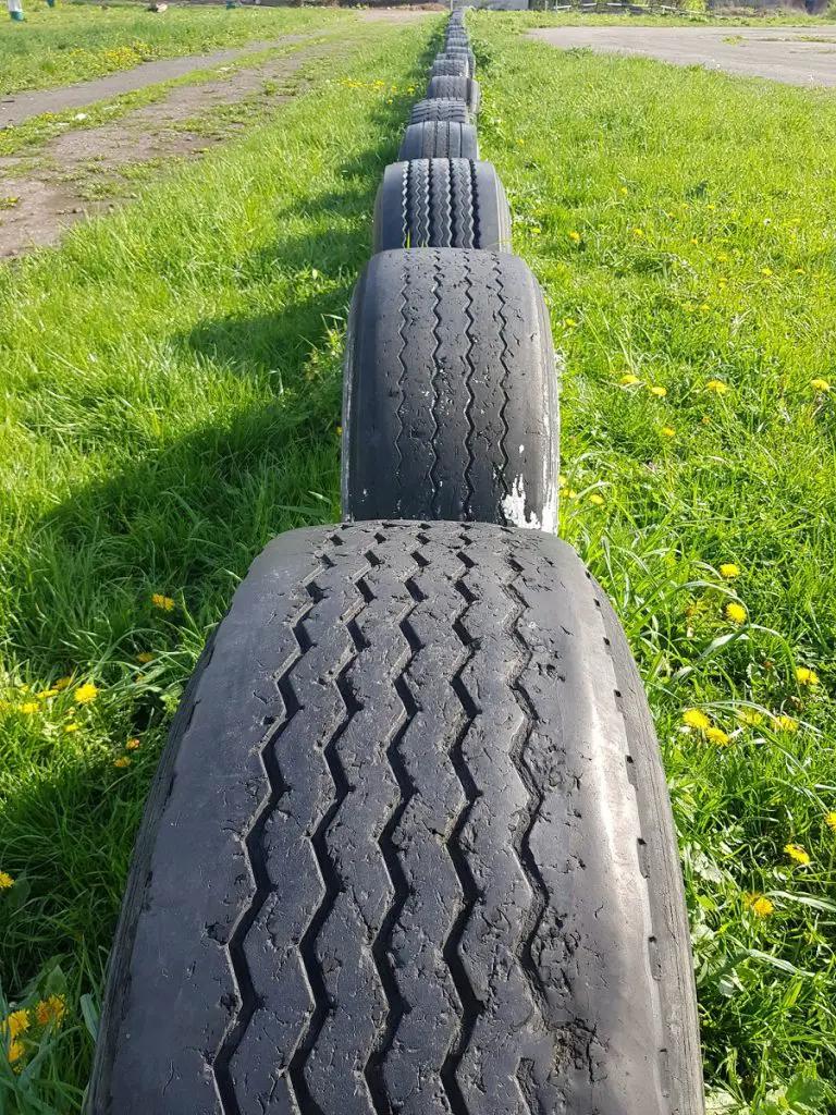 Tires reused as race track barriers or yard art 900w