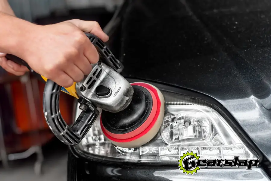 buffing car headlight with wax polish