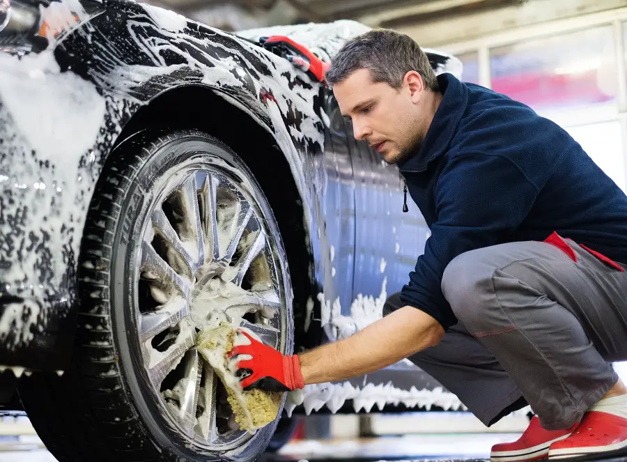 man washing car giving car needed tlc