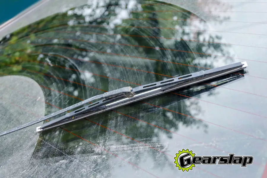 streaked car window windshield needs cleaning