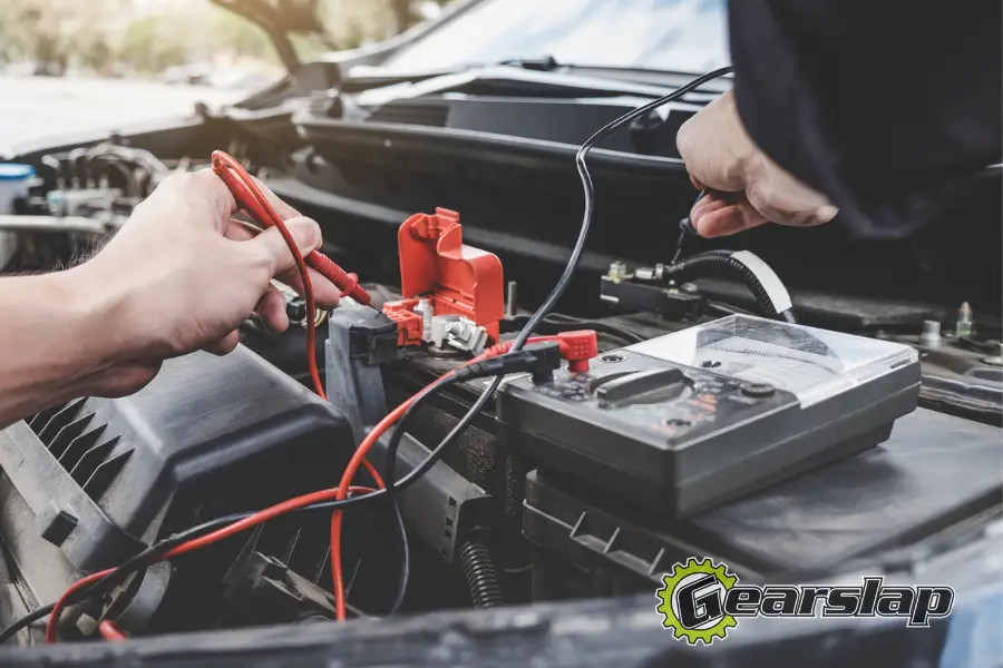 testing voltage on car battery using meter